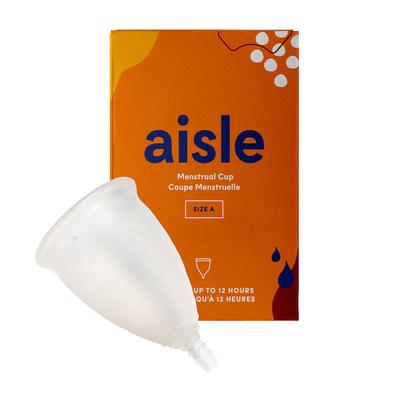 A silicone menstrual cup displayed in front of an orange box labelled as containing a Size A Menstrual Cup by Aisle.