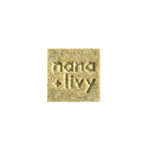 Nana + Livy green soap block containing salt for exfoliation without packaging