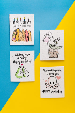 Four birthday cards with animated designs against a blue and yellow background